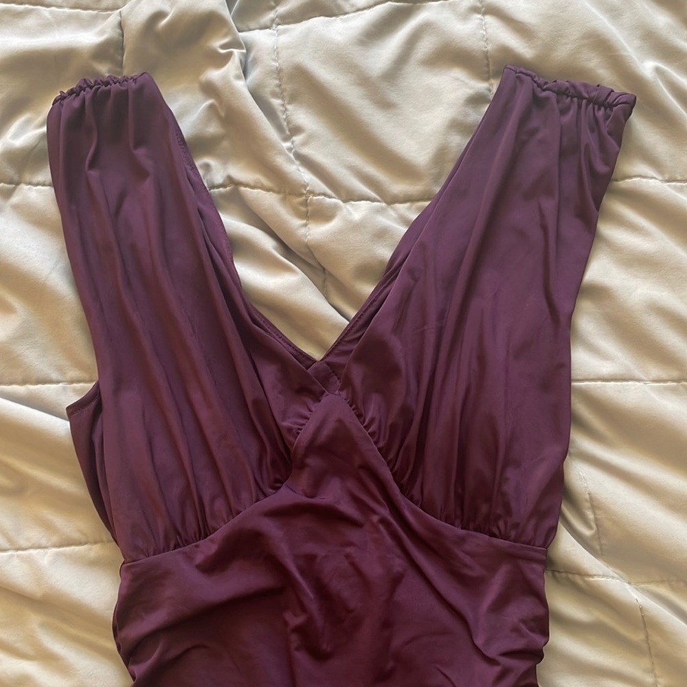 Deep V-neck song, body suit from Xpress never worn
